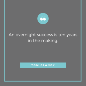 Quoteblock is gray with light blue elements. Quote reads "An overnight success is ten years in the making." Attributed to Tom Clancy.